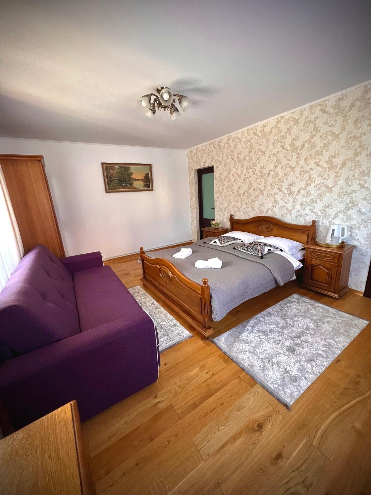 Cameră familie Villa ESQ – zonă relaxare